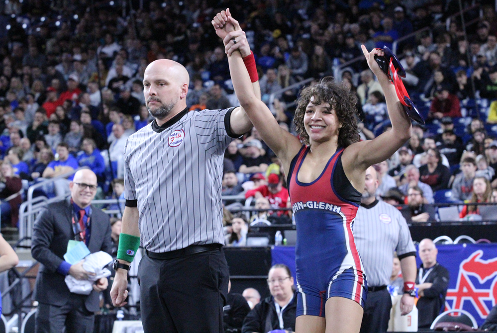 Nakayla Dawson’s arm is raised in victory during last season’s Individual Finals at Ford Field. 