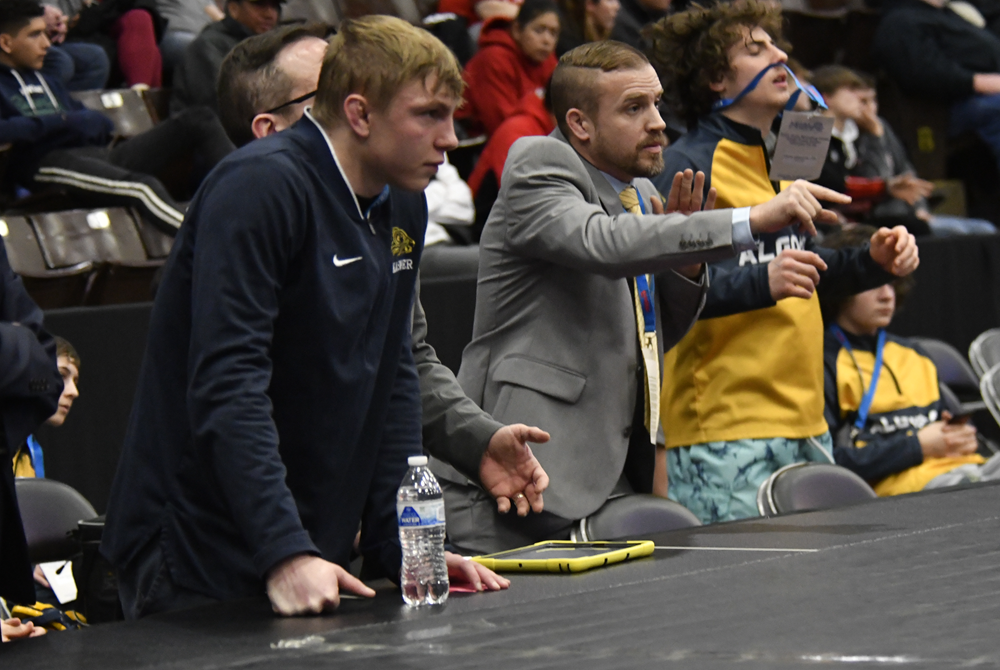 Algonac coaches direct one of their wrestlers during last season's MHSAA Quarterfinals.