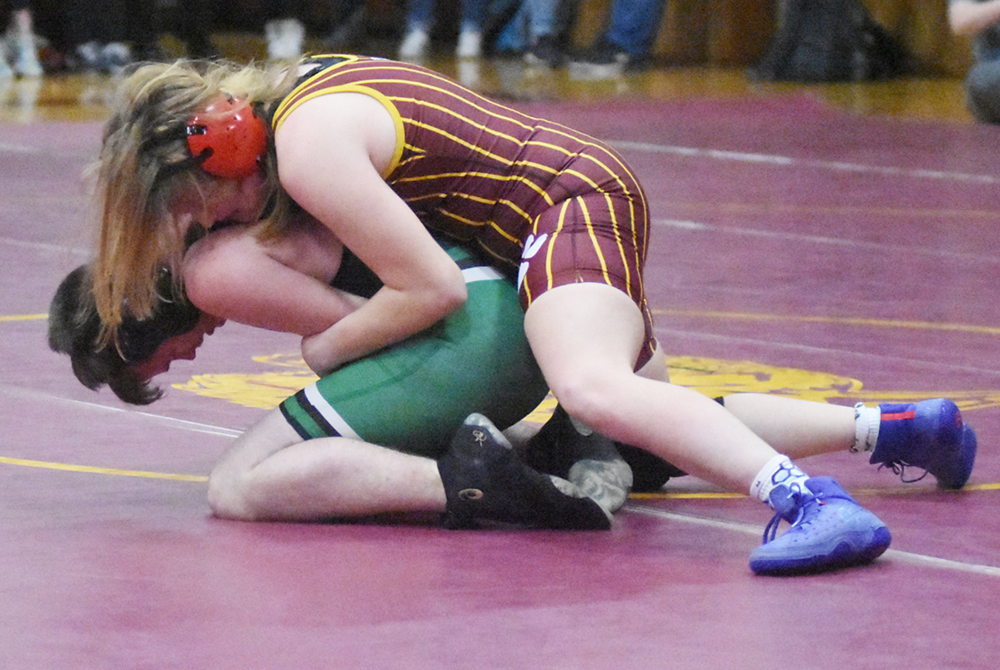 Maddison Ward, top position, from Niles Brandywine has the upper hand in a dual match at home earlier this season.