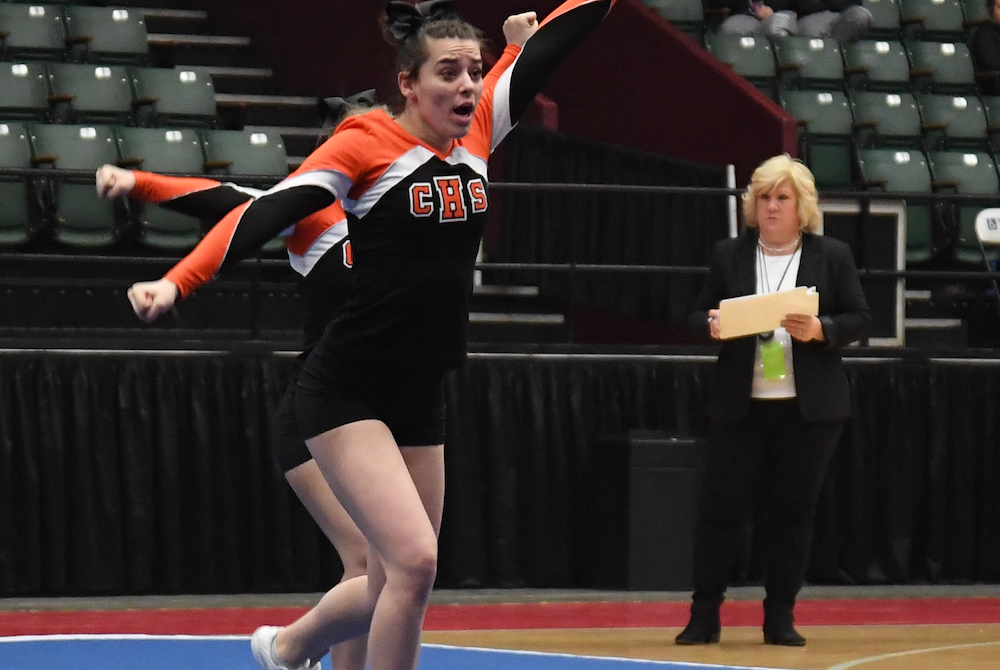 An official monitors the action during the 2019 MHSAA Competitive Cheer Finals.