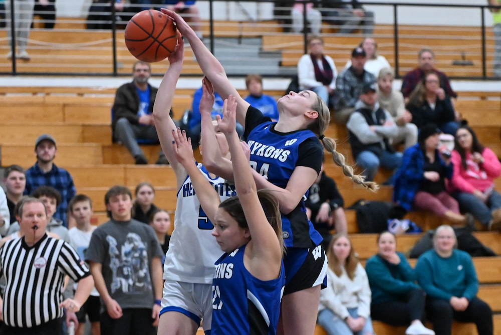 West Iron’s Danica Shamion (24) blocks a shot during her team’s game at Ishpeming on Jan. 15. 