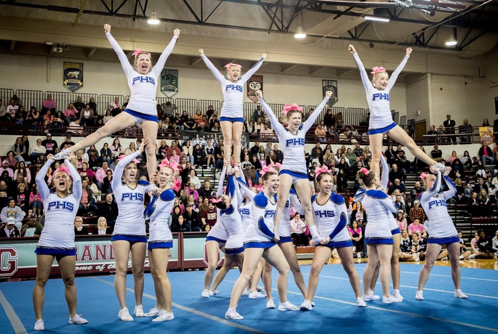 The Plainwell competitive cheer team competes this season; the Trojans are returning to the Finals for the first time since 2003.