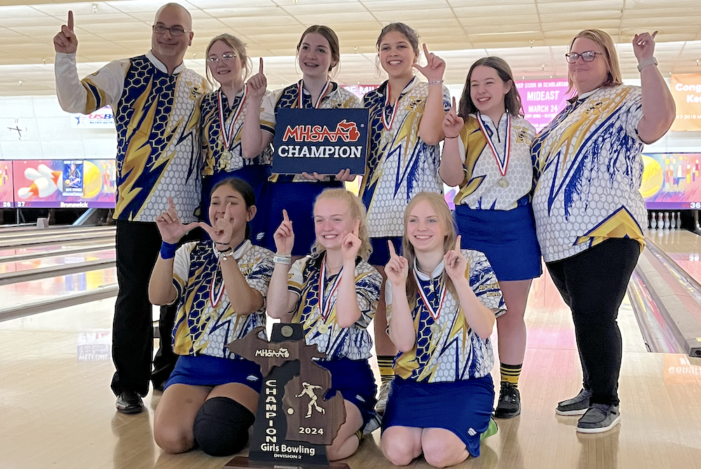 Kearsley's girls bowling team celebrates its Division 2 title.