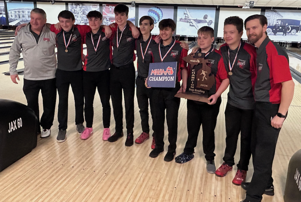 Frankenmuth's boys show off their Division 3 championship trophy.