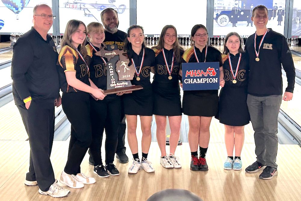 The Bishop Foley girls celebrate their Division 3 bowling title Friday.