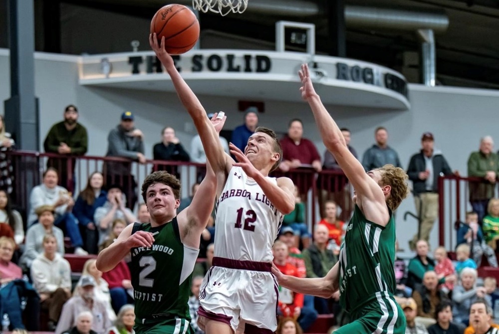 Harbor Light’s Vaughn Henagan (23) gets to the basket during a 59-39 win over Kinross Maplewood Baptist on Dec. 21.