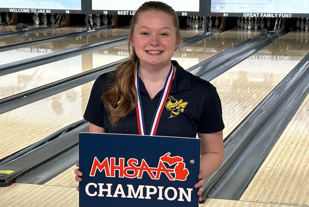 Hillsdale's Chloe Maniford stands for a photo after clinching a Division 3 title.