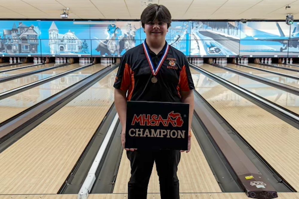 Hudson's Carter Fournier stands for a photo after winning the Division 4 title.