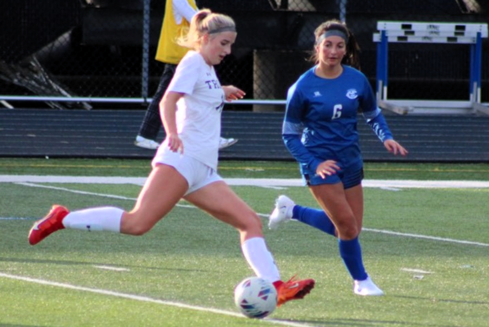 Trenton's Chloe Wishart, left, steps into a shot against Gibraltar Carlson.