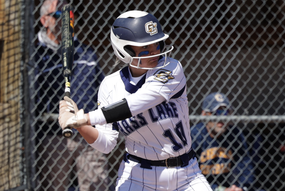 Grass Lake’s Olivia Turner focuses on a pitch coming her way. 