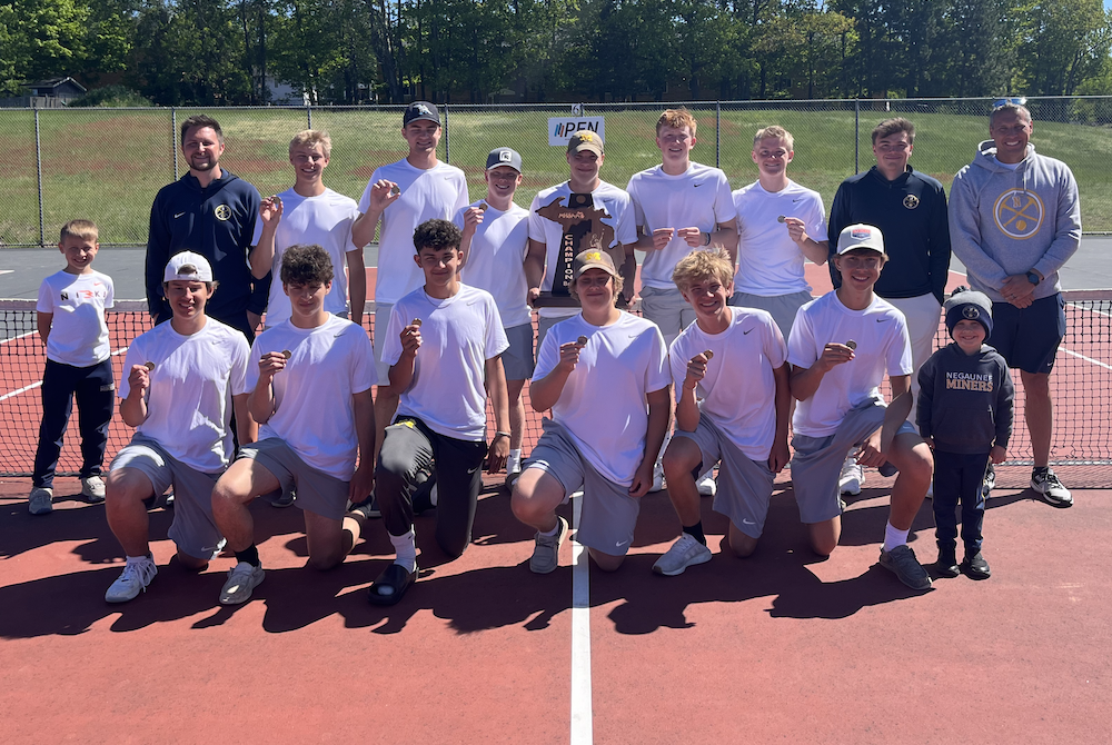 Negaunee takes a team photo after winning the 2024 UPD1 Finals championship in boys tennis.