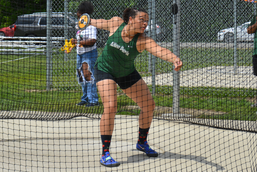 Allen Park's Abigail Russell winds up to throw the discus during a meet.