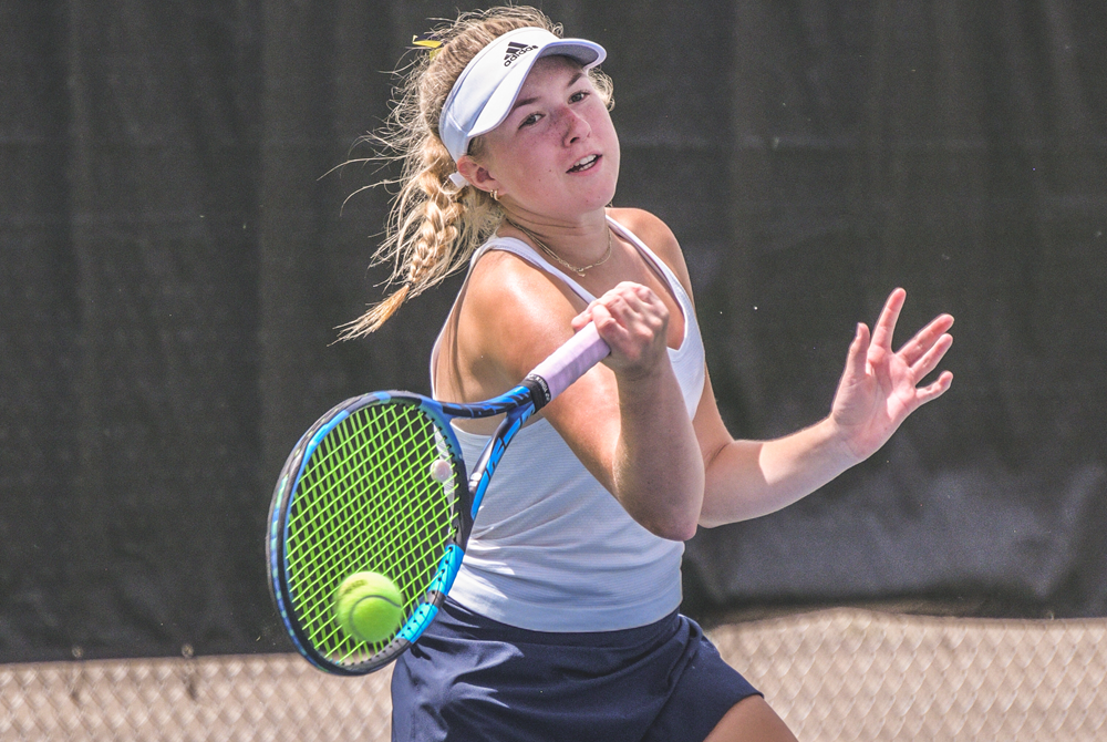 Clarkston's Sydney Geisz hits a forehand during her No. 2 singles title victory Saturday at Midland Tennis Center. 