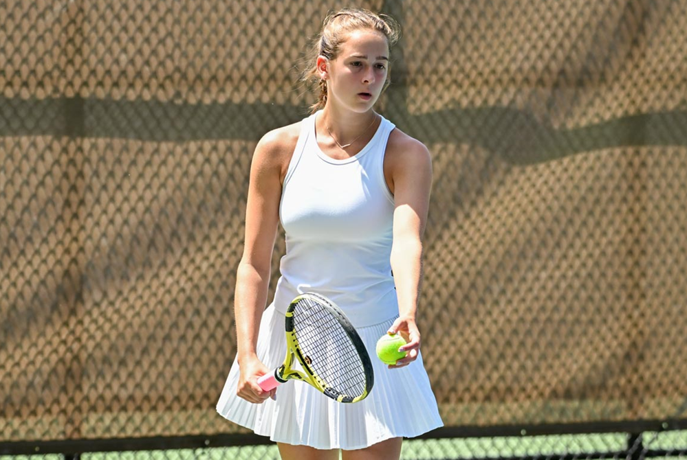 Detroit Country Day’s Marin Norlander prepares to serve during a No. 1 doubles match Friday.