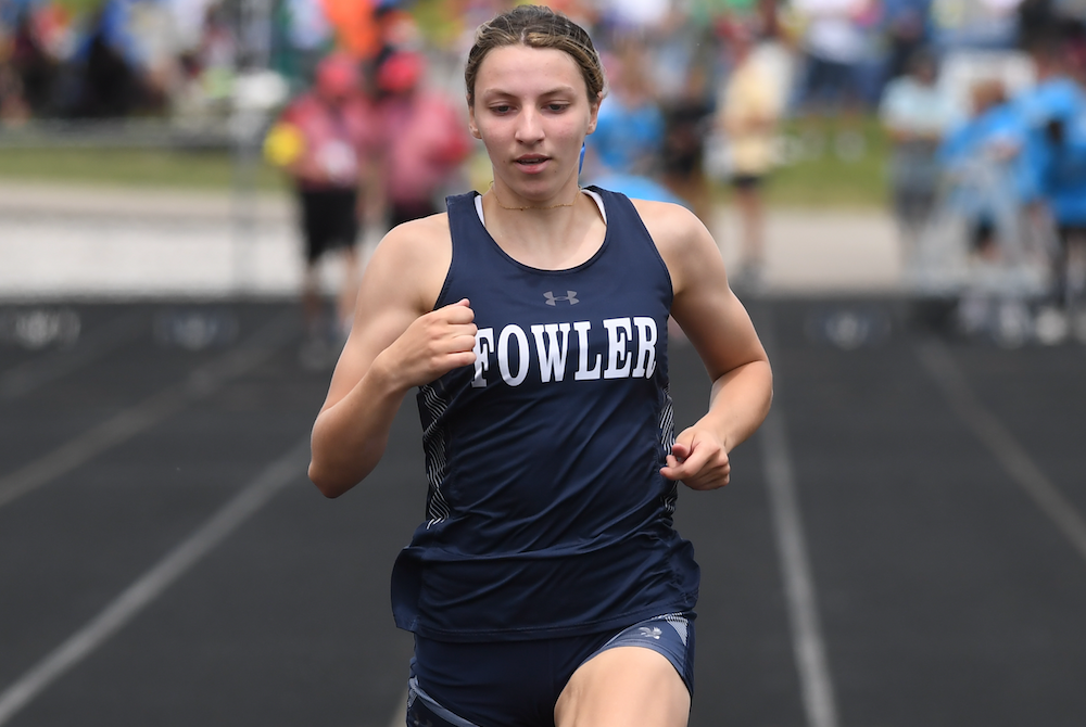 Fowler's Katie Spicer crosses the finish line during a sprint Saturday.