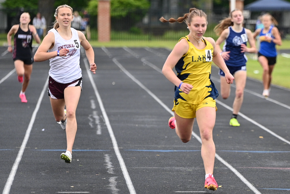 Lake Linden-Hubbell's Emily Jokela sets a meet record in the 400 with a winning time of 58.61 on Saturday. 