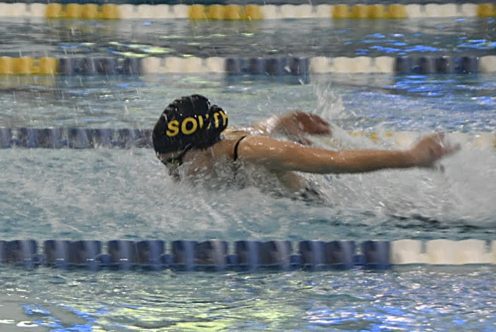 Caroline Bryan swims the butterfly this season.