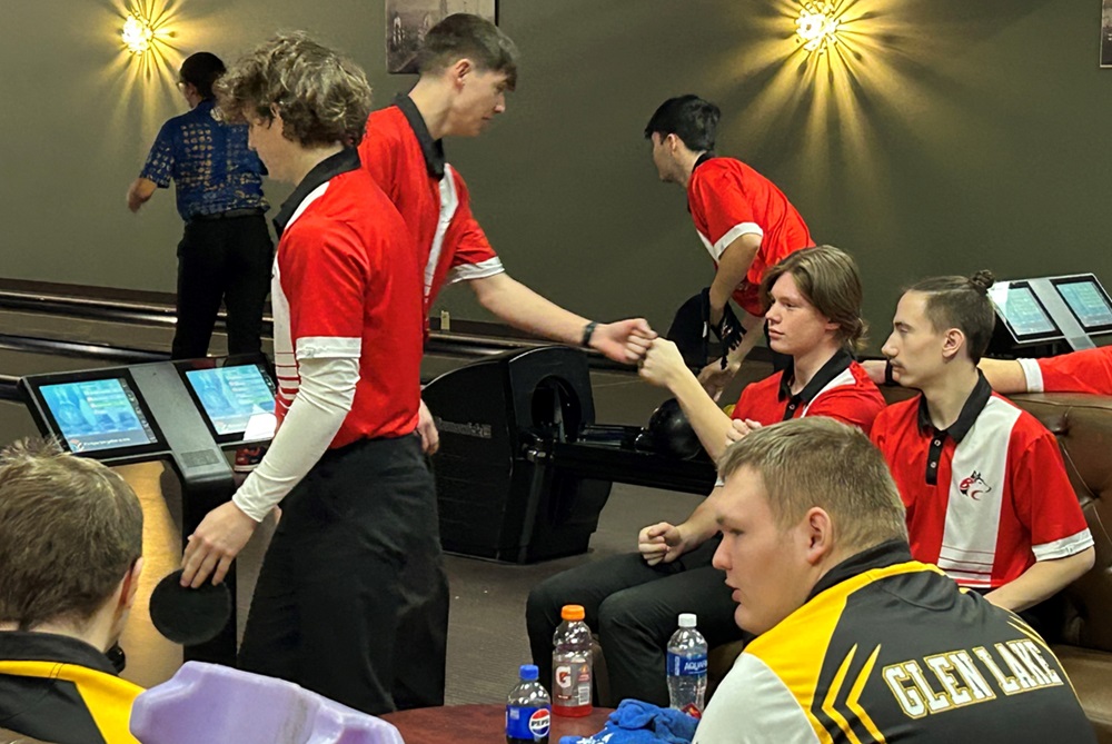 Benzie bowlers share a fist bump during a recent match.