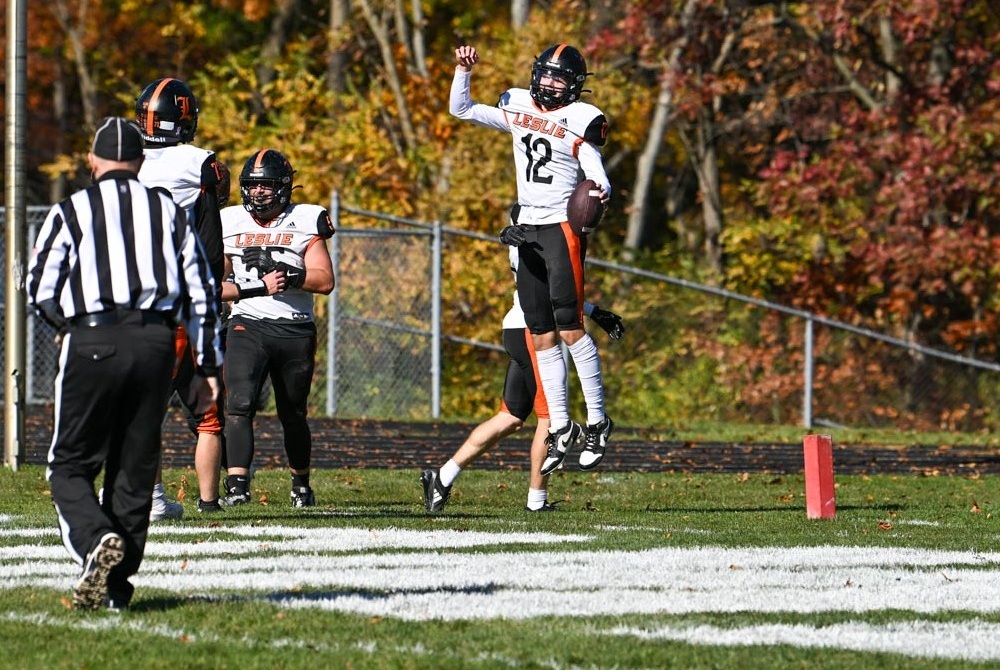 Leslie quarterback Joel Cranmore and his teammates celebrate a touchdown last season.