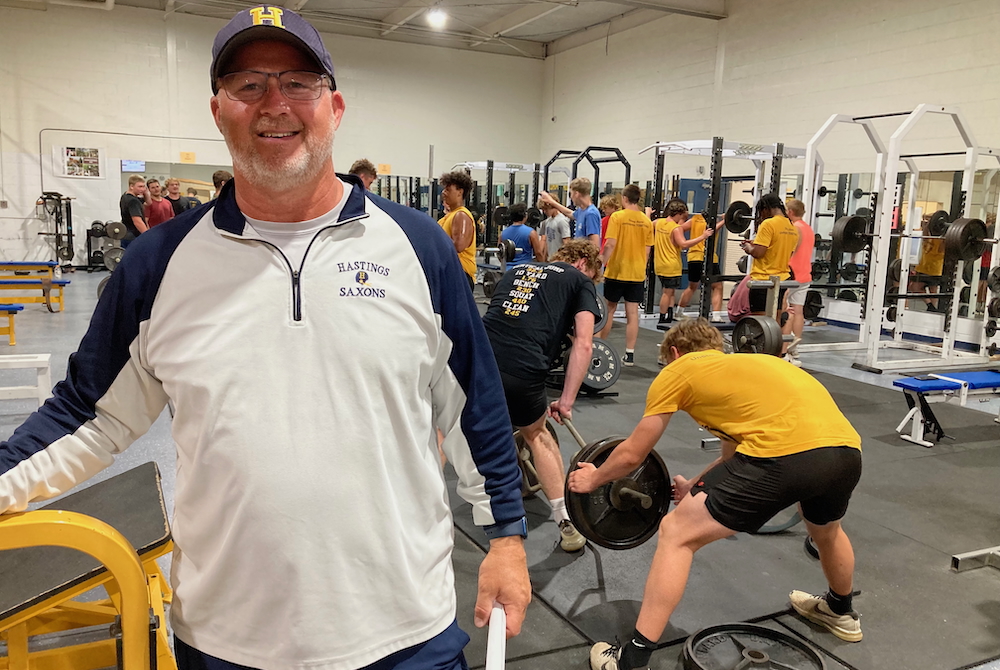 Hastings coach Jamie Murphy takes a moment for a photo during his team’s weight training session earlier this month.