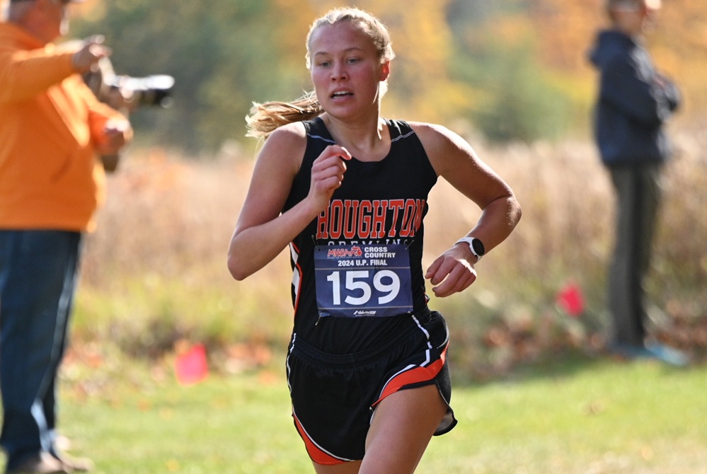 Houghton senior Tessa Rautiola runs to the Upper Peninsula Division 2 Finals championship last season.