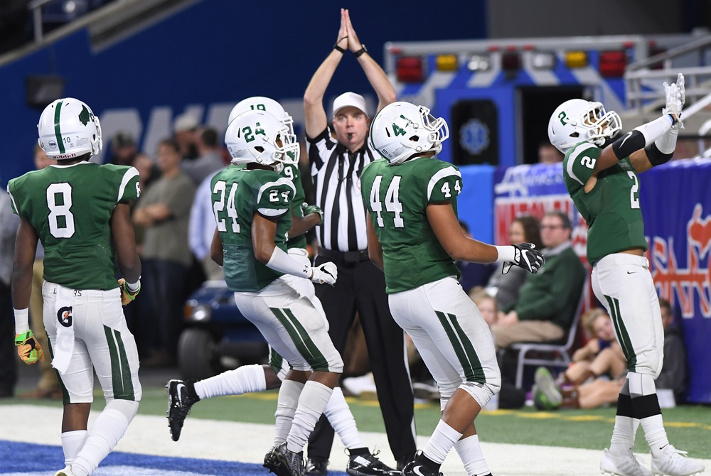 West Bloomfield players celebrate a safety during the 2017 Division 1 Football Final.