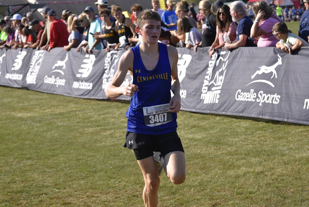 Centreville’s Will Hulin sprints the closing stretch Oct. 4 at the Portage Invitational.