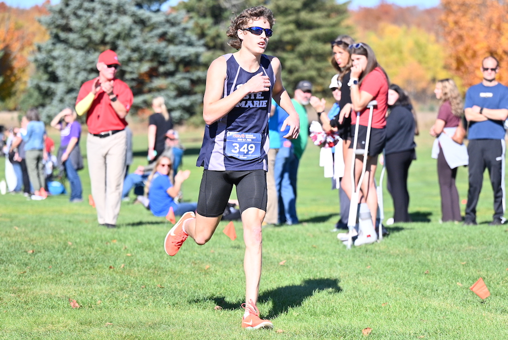 Sault Ste. Marie's Gabe Litzner is the first to cross the finish line in the UP Division 1 Boys Final on Saturday in Munising. 