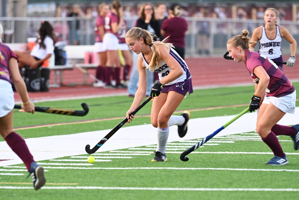 Ann Arbor Pioneer's Lucy Peikert (28) controls possession during her team's 1-1 tie against Dexter on Sept. 15.