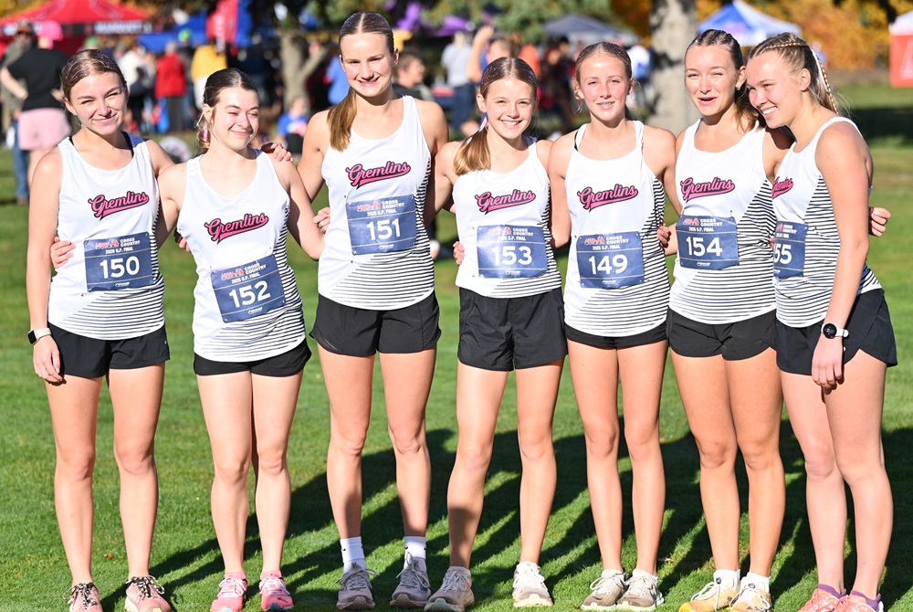From left, standing for a photo, are Houghton's Lilli Gast (150), Cecilia McDonald (152), Romi Mattson (151), Sela Niska (153), Holly Cooke (149), Jovie Williams (154), and Tessa Rautiola (155). 