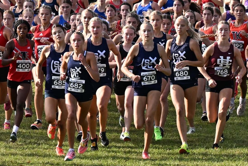 Several teams, including this weekend's expected Division 2 contender Grand Rapids South Christian, take their opening strides during the Otsego Invitational Division 2 race on Sept. 27. 