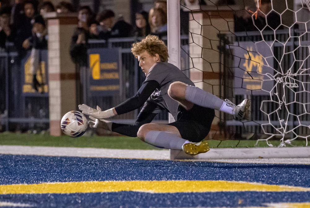Portage Central keeper Gunnar Thorhallsson makes a save during his team’s Division 1 championship victory Saturday night. 