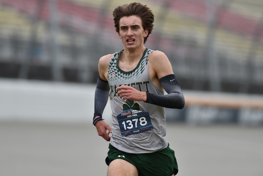 Kalamazoo Hackett Catholic Prep’s Marek Butkiewicz races toward the finish line and a repeat championship Saturday at MIS.