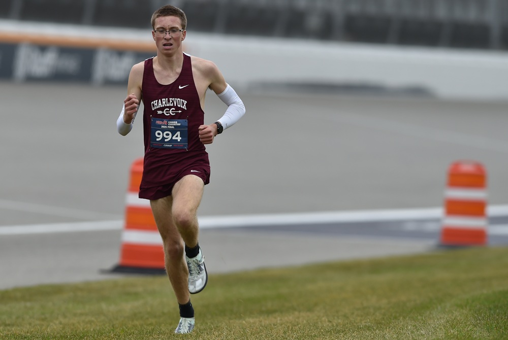 Charlevoix's Hunter Eaton runs toward the finish line at the Lower Peninsula Division 3 Final at Michigan International Speedway.
