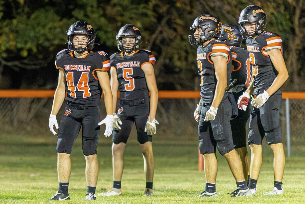 Jonesville players take the field for their final home game last month at their now former field. 