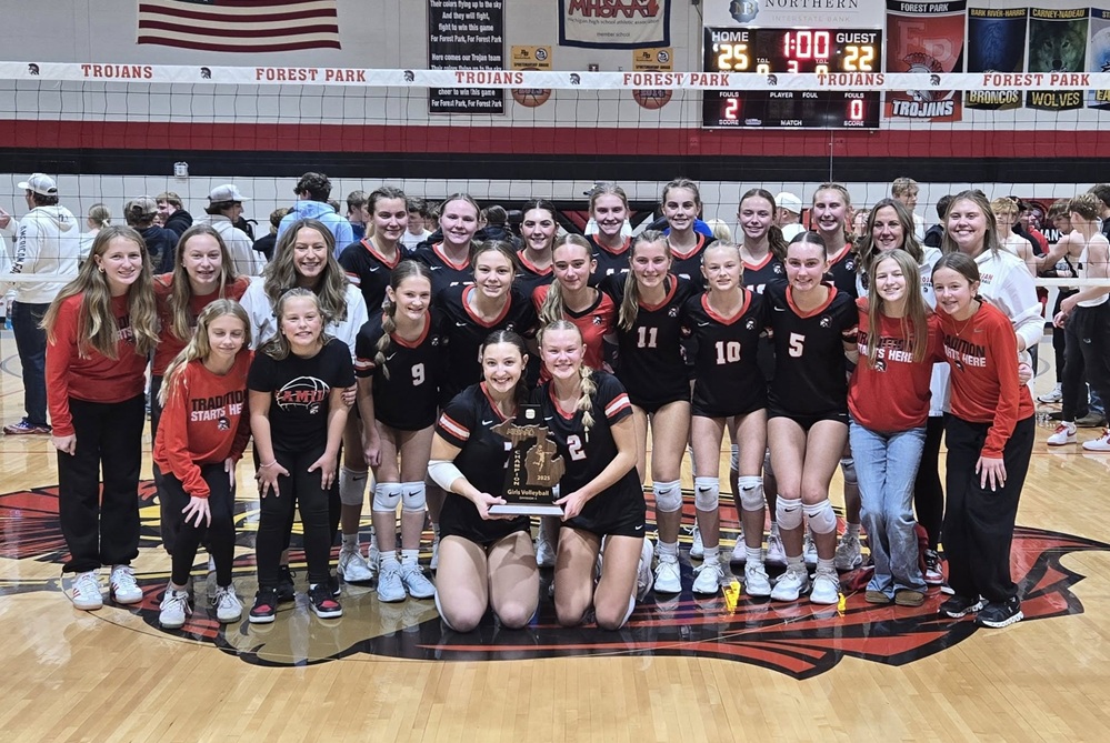 The Crystal Falls Forest Park girls volleyball team takes a photo after winning its District championship against Wakefield-Marenisco on Nov. 6.