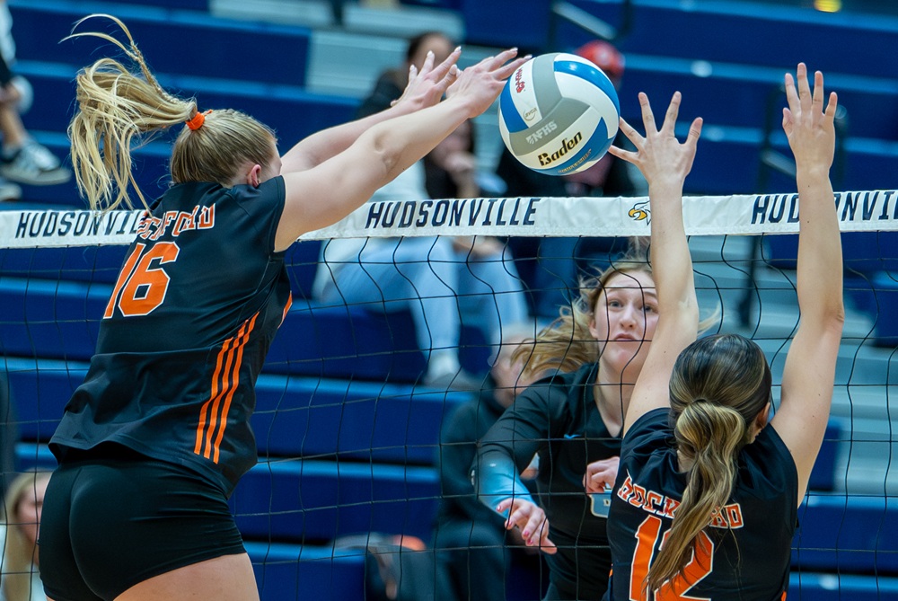 Rockford’s Mallory Wandel (16) and Grace Crelly (12) put up a block during the Rams’ Division 1 Quarterfinal win over Grand Rapids Forest Hills Northern.