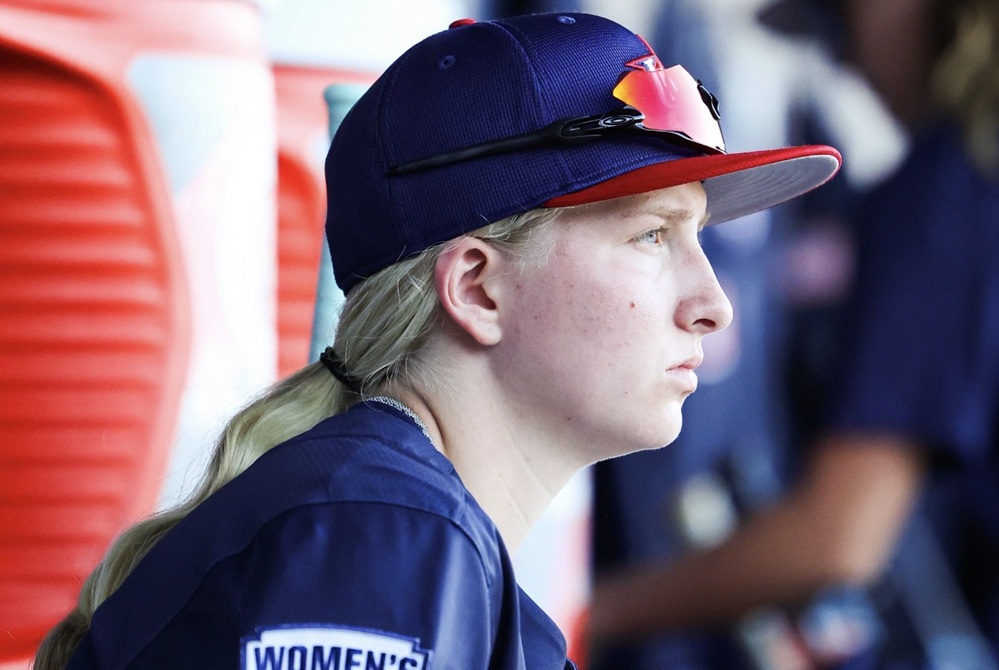 Airport grad Bella Villarreal watches from the dugout during a USA Baseball Development Program event.