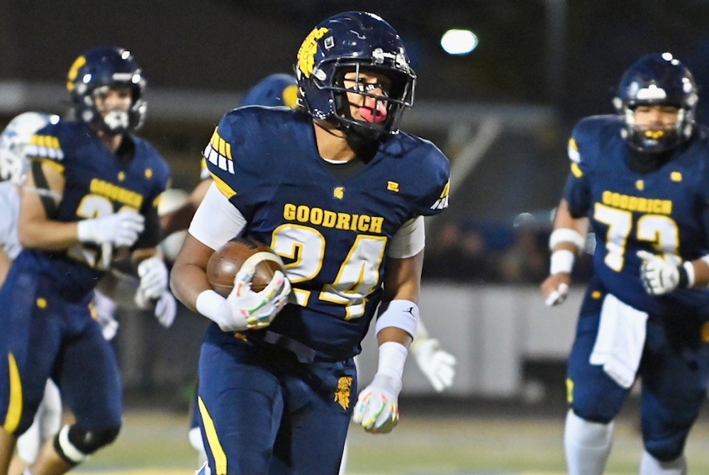 Goodrich's Jakoby Lagat charges upfield during his team's 63-42 Week 9 win over Gladwin. 