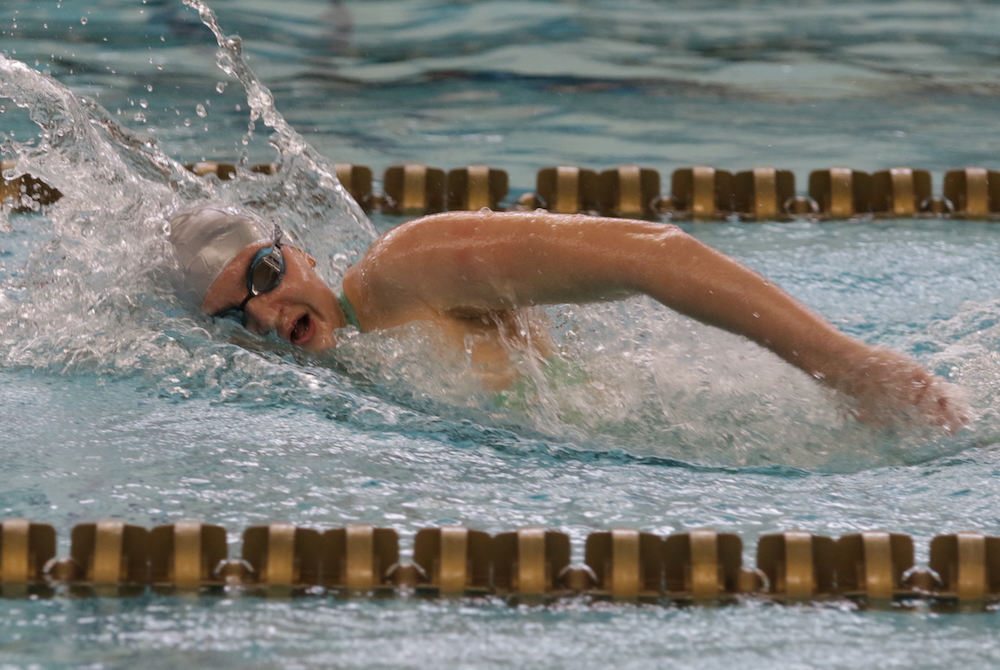 West Bloomfield’s Elizabeth Eichbrecht swims to an all-Finals record in the 500 freestyle Friday at Oakland University.