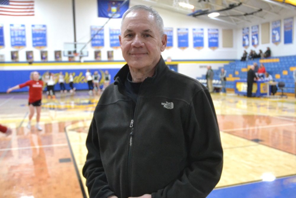 Cadillac’s Bill Allen, shown here following a varsity girls basketball game in February in Evart, is in his 50th year as an MHSAA registered official. 