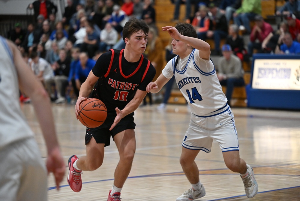 While being defended by Ishpeming's Dax Kakkuri on Friday, Ishpeming Westwood's Ethan Marta makes a move to the basket.