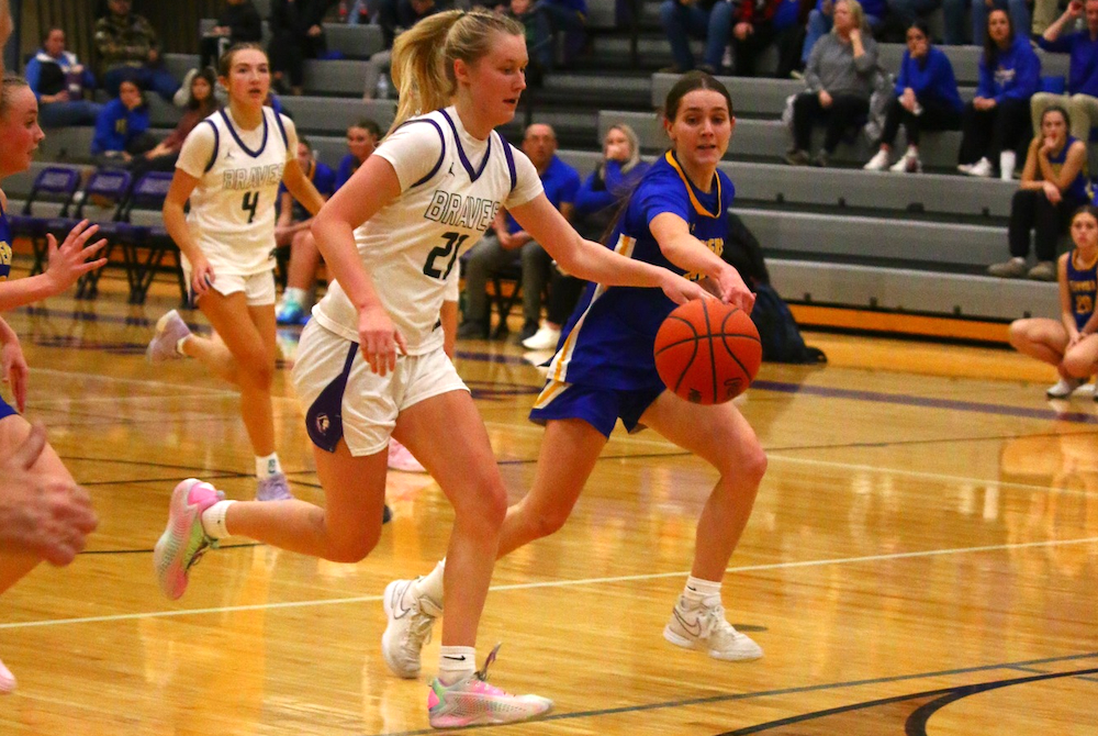 Gladstone's Lillie Johnson leads a fastbreak against Kingsford early this season.