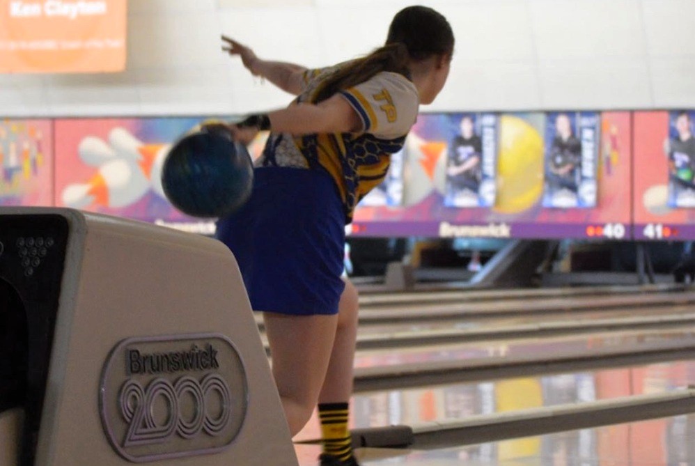 Flint Kearsley's Delaney Vanier bowls during a match. 