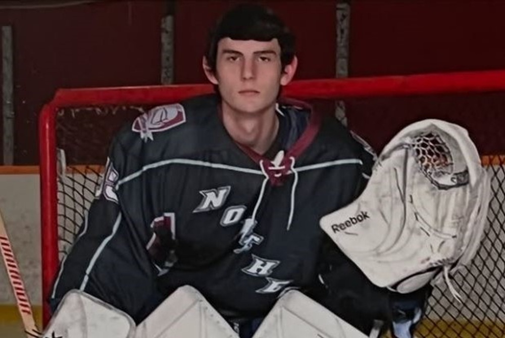 Connor Hellebuyck poses for a photo while playing at Walled Lake Northern. 