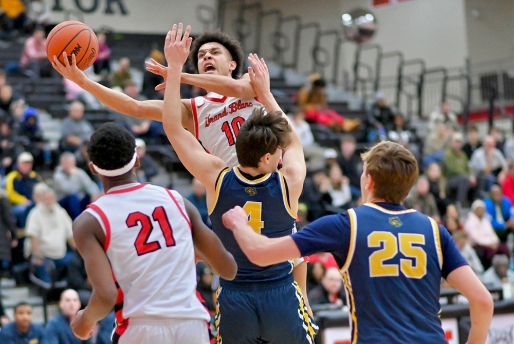Grand Blanc’s Emmanuel Cooley gets to the rim during his team’s 54-47 win over Clarkston last month.