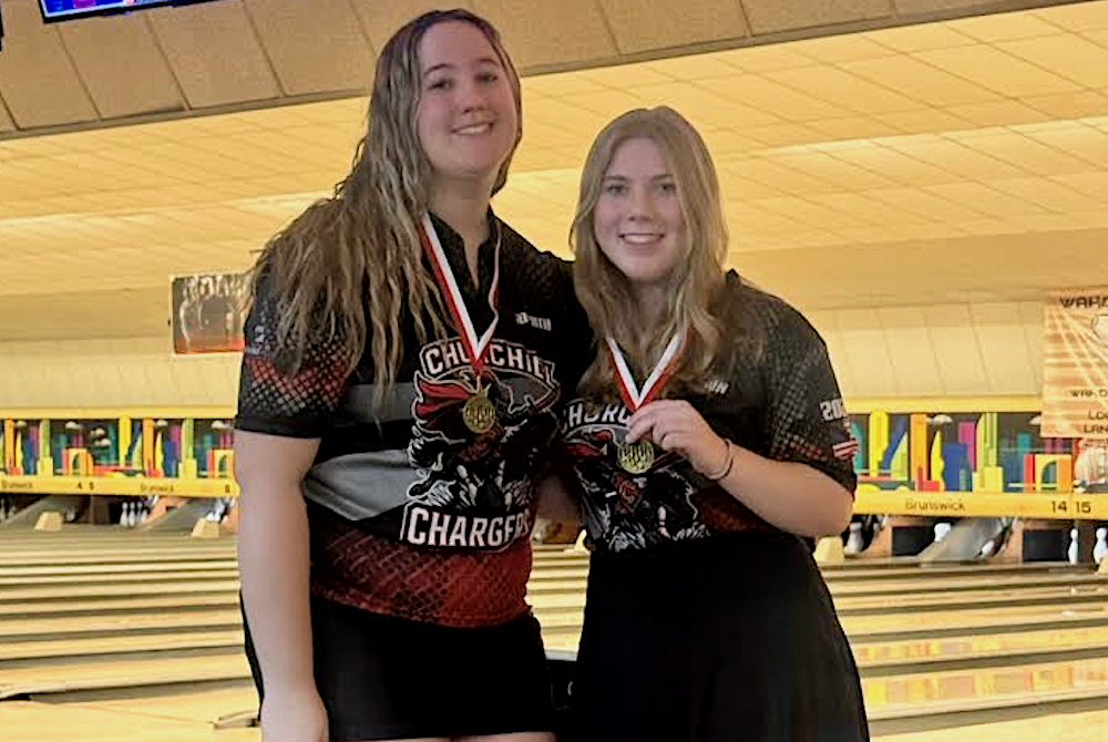 This is a photo of bowlers Sophia Best and Madison Martin wearing their tournament medals.