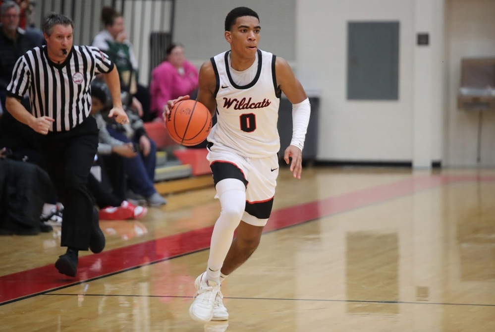 Grand Rapids Northview's Cam Ryan brings the ball up the court. 