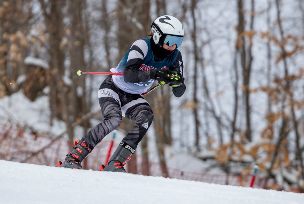 A skier races downhill during the Division 1 Finals at Boyne Mountain.