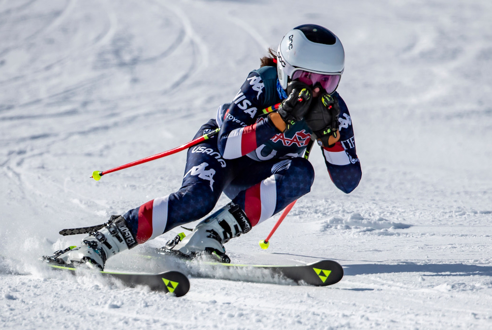A skier races downhill during the Division 1 Finals.